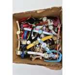 A BOX OF ASSORTED LADIES AND GENTS FASHION WRISTWATCHES, mostly quartz movements, with names to