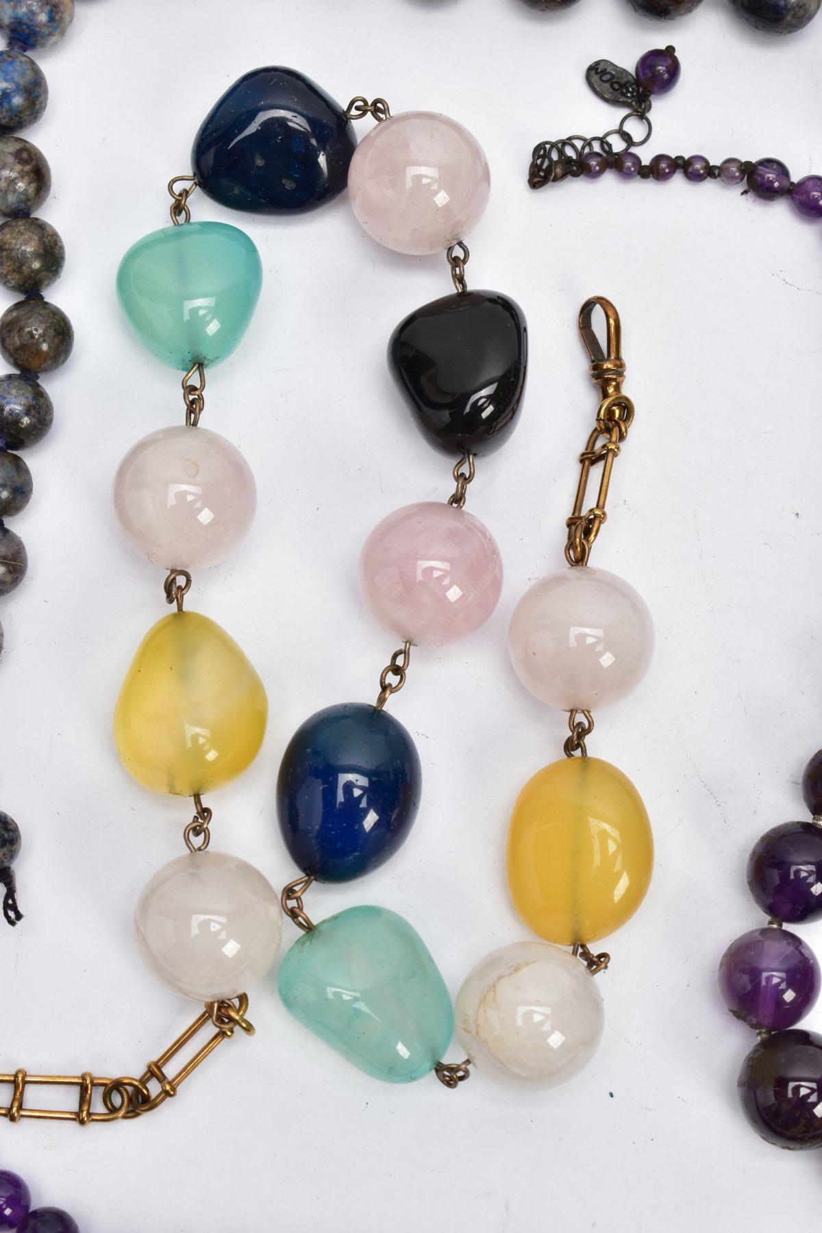 A SELECTION OF GEM BEAD NECKLACES, to include two amethyst bead necklaces, a carved amethyst - Image 5 of 7