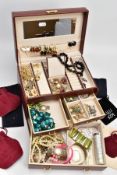 A JEWELLERY BOX WITH CONTENTS, burgundy jewellery box, opens to reveal three draws and a top storage