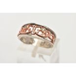 A CLOGAU SILVER AND GOLD RING, designed with a rose gold openwork centre, set with single cut