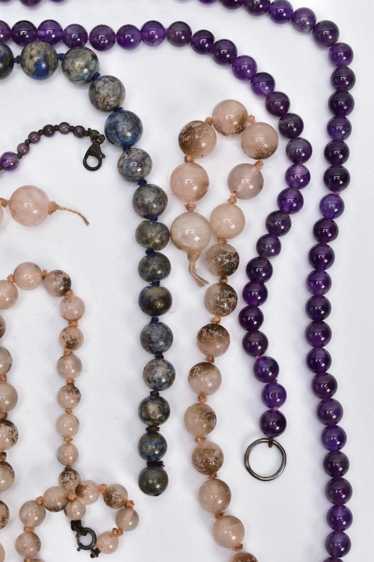 A SELECTION OF GEM BEAD NECKLACES, to include two amethyst bead necklaces, a carved amethyst - Image 2 of 7