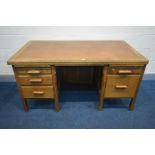 AN EARLY TO MID 20TH CENTURY OAK PEDESTAL DESK, labelled Astrola, with brown leatherette inlay,