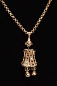 A 9CT GOLD, GEM SET CLOWN PENDANT AND CHAIN, the articulated clown pendant set with red and