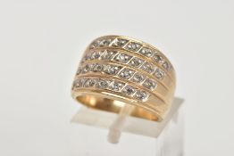 A 9CT GOLD DIAMOND DRESS RING, a wide band designed with four rows of single cut diamonds, stamped