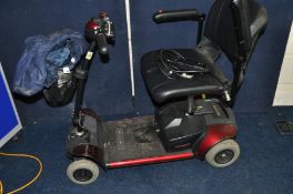 A PRIDE GO GO ELITE TRAVELLER DISABILITY SCOOTER (spares or repairs) doesn't appear to charge and no