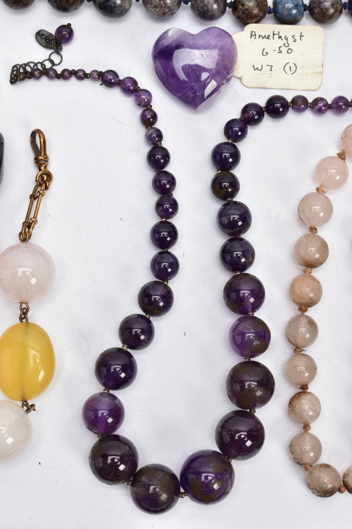 A SELECTION OF GEM BEAD NECKLACES, to include two amethyst bead necklaces, a carved amethyst - Image 4 of 7