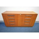 A G-PLAN FRESCO TEAK DOUBLE CHEST, with a double bank of four graduated drawers, width 142cm x depth