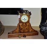 AN EARLY 20TH CENTURY ENAMEL DIAL CLOCK MOVEMENT FITTED INTO A ROSEWOOD CASE, a marriage, the case