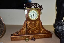 AN EARLY 20TH CENTURY ENAMEL DIAL CLOCK MOVEMENT FITTED INTO A ROSEWOOD CASE, a marriage, the case