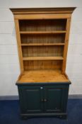 A PINE AND PARTIALLY GREEN PAINTED DRESSER, the top with three plate racks, above a base with double