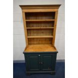 A PINE AND PARTIALLY GREEN PAINTED DRESSER, the top with three plate racks, above a base with double