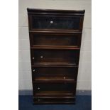 A GLOBE WERNICKE FIVE SECTION MAHOGANY BOOKCASE, glazed fall front doors, on a base with a single