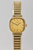 A GENTS GOLD-PLATED 'LONGINES' WRISTWATCH, hand wound movement, gold cushion dial signed 'Longines',