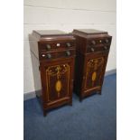 A PAIR OF GEORGE IV MAHOGANY PEDESTAL CUPBOARDS, shaped top, two drawers with turned brass
