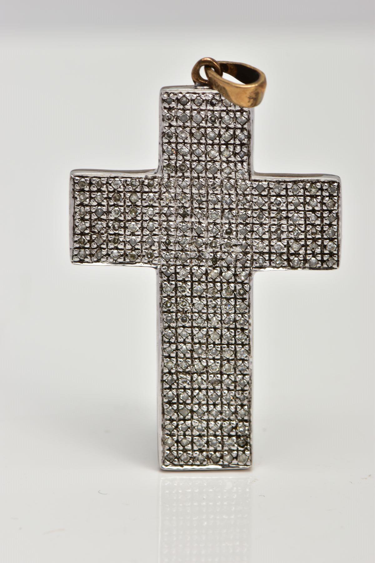 A 9CT GOLD DIAMOND CROSS PENDANT, the cross pendant set throughout with single cut diamonds,