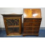 A REPRODUCTION MAHOGANY BUREAU, fall front enclosing a fitted interior above four drawers, width