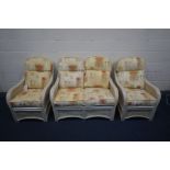 A CREAM WICKER THREE PIECE CONSERVATRY SUITE, comprising a settee and two armchairs (3)