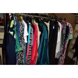 A QUANTITY OF LADIES CLOTHING, to include dresses, blouses, jackets and coats, etc, sizes from 10 to