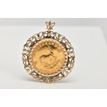 A KRUGERRAND PENDANT, the South Africa 1975 1 oz Krugerrand within a scrolling 9ct gold mount, mount