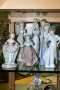 SEVEN NAO FIGURES OF GIRLS, ONE BOXED, includes a ballet dancer, girl yawning, height 28cm, young