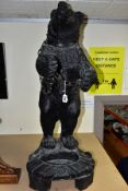 A PLASTER BEAR STICK STAND IN THE BLACK FOREST STYLE, moulded standing on hind legs with a chain