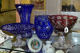 FOUR PIECES OF 20TH CENTURY FLASH CUT GLASSWARE, comprising two blue to clear vases, height 31cm and