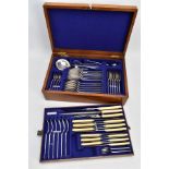 A CANTEEN OF CUTLERY, oak canteen opens to reveal a complete set of forty-eight piece set of EP