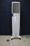 A SYMPHONY DIET 50i EVAPORATIVE AIR COOLER with remote and instructional DVD (PAT pass and