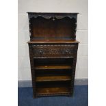 A REPRODUCTION GEORGIAN STYLE CARVED OAK OPEN BOOKCASE, with a single drawer, width 69cm x depth