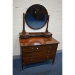 A GEORGIAN STYLE MAHOGANY AND CROSSBANDED DRESSING TABLE, with a circular bevelled edge mirror,