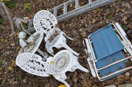 A WHITE PAINTED CAST ALUMINIUM GARDEN TABLE with pierced 65cm diameter top, a pair of similar