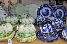 A PARAGON 'CONVULVULOUS' PATTERN PRINTED AND TINTED TEA SET AND A ROYAL DOULTON BLUE AND WHITE