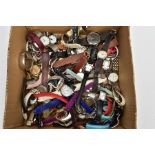 A BOX OF ASSORTED LADIES AND GENTS FASHION WRISTWATCHES, mostly quartz movements, with names to