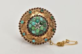 A VICTORIAN TURQUOISE AND DIAMOND BROOCH, of a circular domed form, set with a central star set,