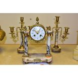 A LATE 19TH CENTURY GILT METAL AND MARBLE CLOCK GARNITURE, the clock with gilt metal cone finial and