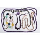 A SELECTION OF GEM BEAD NECKLACES, to include two amethyst bead necklaces, a carved amethyst