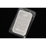 A ONE OUNCE SILVER INGOT, 'Asahi' refining, fine silver 999, 1 ounce troy, A117666, within a plastic