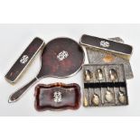 A FOUR PIECE TORTOISE SHELL AND SILVER VANITY PIECES AND A SET OF SIX TEASPOONS, the vanity set