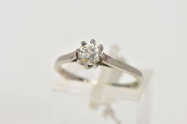 A SINGLE STONE DIAMOND RING, the round brilliant diamond in an eight claw setting, estimated diamond