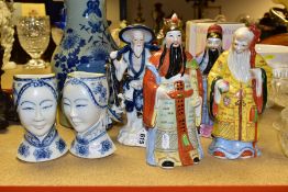 A GROUP OF MODERN ORIENTAL CERAMICS comprising Chinese wall pockets in the form of female faces,