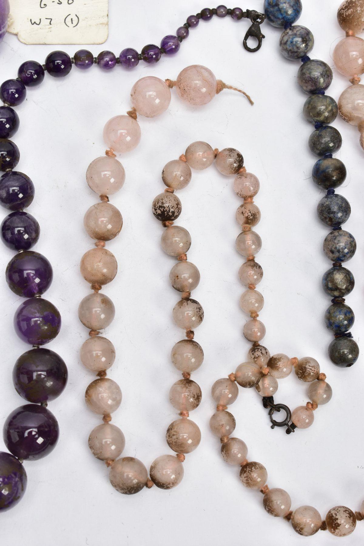 A SELECTION OF GEM BEAD NECKLACES, to include two amethyst bead necklaces, a carved amethyst - Image 3 of 7