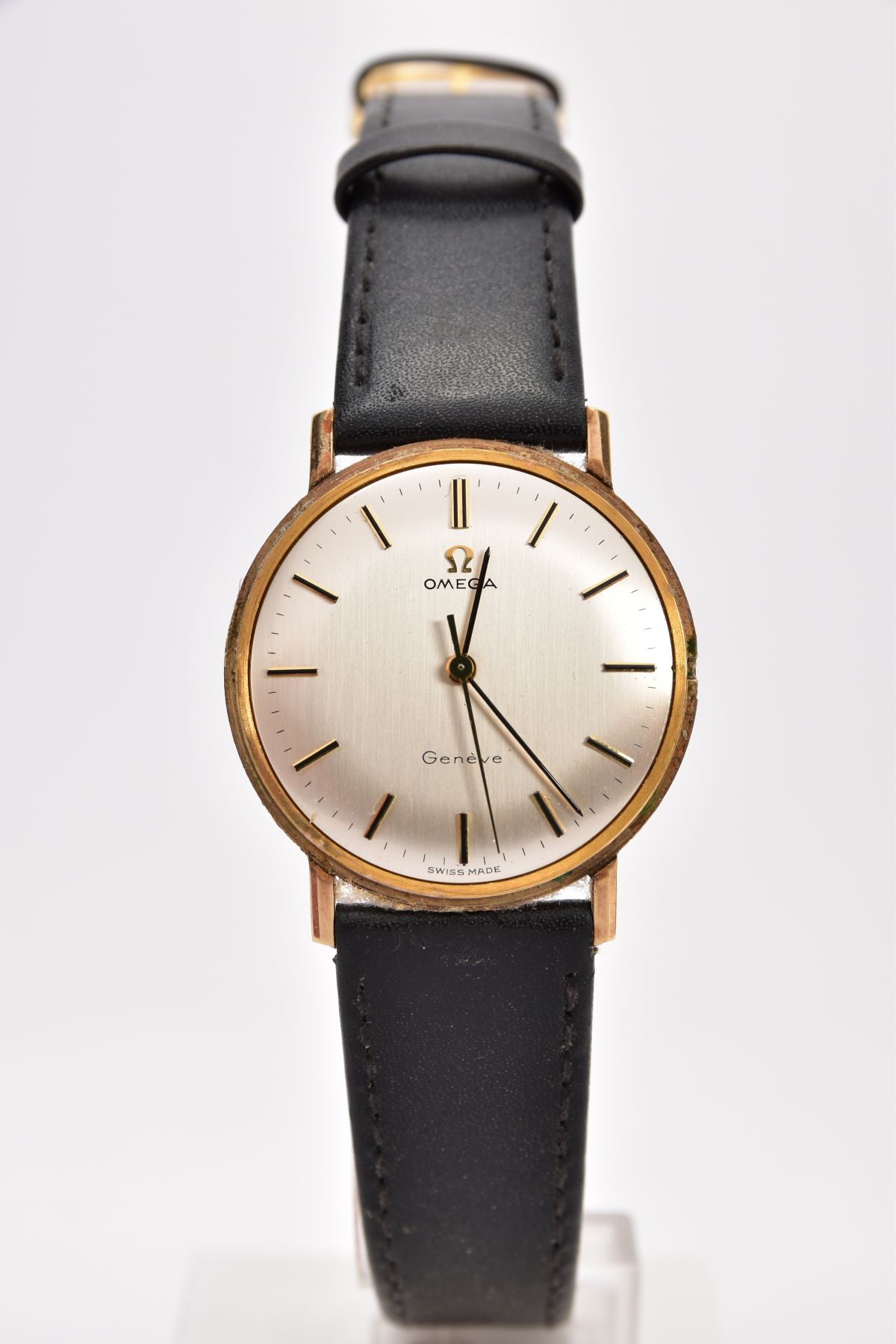 A GENTS 9CT GOLD 'OMEGA GENEVE' WRISTWATCH, (missing crown) round silver dial signed 'Omega Geneve',