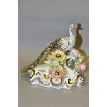 A BOXED ROYAL CROWN DERBY PEACOCK (LOW), modelled as perching on a florally encrusted branch, gilt