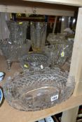 TEN PIECES OF CLEAR CUT GLASS, including a Waterford Crystal oval bowl with a castellated rim and