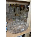 TEN PIECES OF CLEAR CUT GLASS, including a Waterford Crystal oval bowl with a castellated rim and