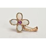 A 9CT GOLD OPAL AND RUBY FLOWER BROOCH, designed with four oval opal cabochon petals and a central