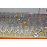 A QUANTITY OF CUT GLASS AND CRYSTAL DRINKING GLASSES ETC, to include grapefruit dishes, two boxed