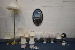 A QUANTITY OF LIGHTING, comprising four brassed table lamps,a brassed standard lamp, onyx, chrome