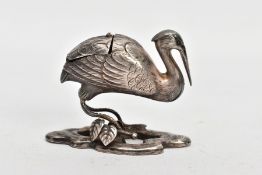 A CHINESE SILVER STORK PEPPERETTE, in the form of a stork with hinged lid to the back section,