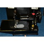 THREE CASED ELECTRIC SEWING MACHINES IN CARRY CASES, comprising a Singer 222K, serial no EK325799,
